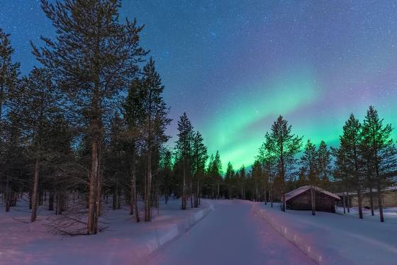 Asgard Cottages and Aurora Aurora as viewed from Utsjoki in Lapland, Finland