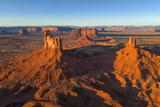 King on his Throne and Stagecoach Butte Side view of Stagecoach Butte and King on his Throne. The Big Indian and Sentinel Mesa are in the background. Taken after sunrise.