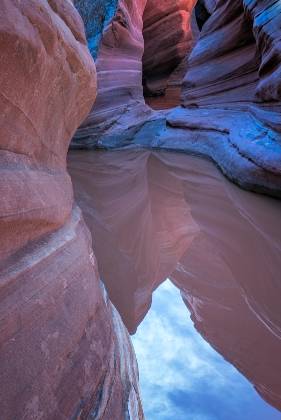 Flooded entrance to Narnia Slot Canyon Water and mud near the entrance to Narnia Slot Canyon