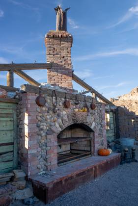 Fireplace and Pots Fireplace ruins seen in Nelson ghost town, Nevada,