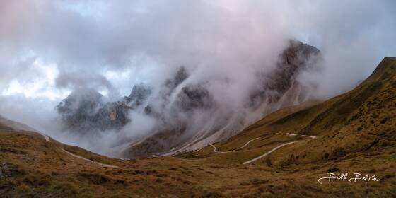 View from Passo Rolle View of Cima Silvano in the fog from Passo Rolle in the Dolomites, Italy.