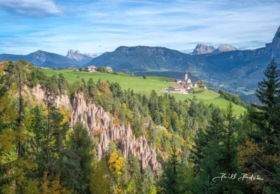 The Earth Pyramids 1 The Earth Pyramids and St. Nicholas Church in Mittelberg, the Dolomites, Italy.