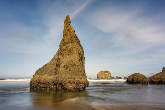 Sea Stack reflected 2 Sea stacks reflected at Bandon Beach on the Oregon Coast
