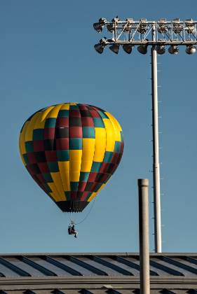 Framed Balloons framed by stadium lights at the Page Balloon Regatta