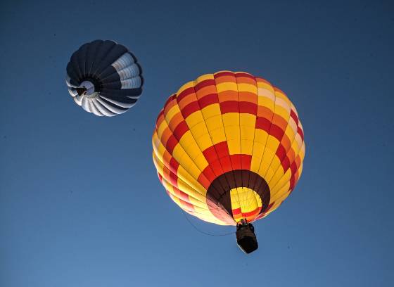 In the air 2 Balloons in the air at the Page Balloon Regatta