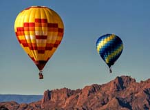 Hot Air Balloons over Red Cliffs at the Page Balloon Regatta