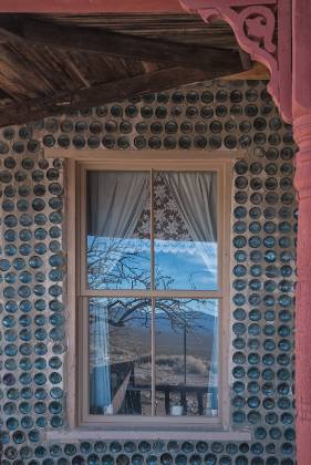 Bottle House Reflection Bottle House in Rhyolite ghost town, Nevada