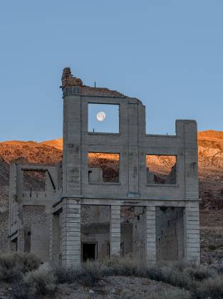 Cook Bank framing Super Moon 2 Cook Bank in Rhyolite ghost town, Nevada
