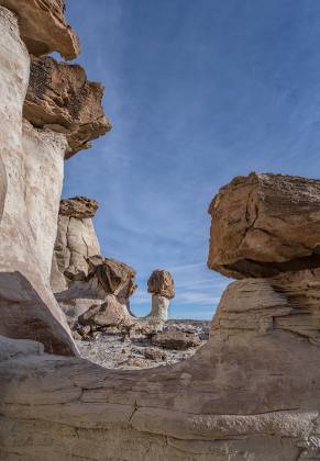 Curved Hoodoo 3 Hoodoos made from Entrada Sandstone with Dakota Caprocks in the Upper Rimrocks of the Grand Staircase