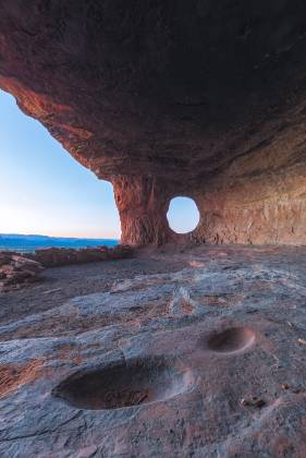 Metates at Shamans Cave Metates in Shamans Cave, also known as Robbers Roost, in Sedona at sunrise