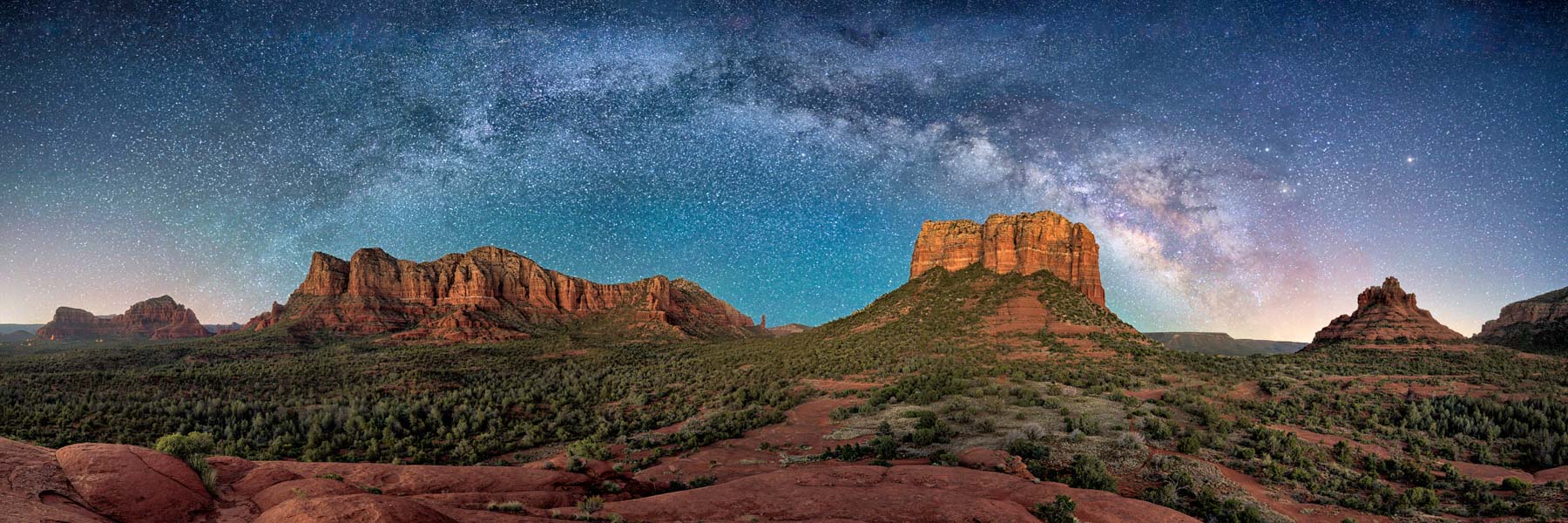 Panorama of the Milky Way over Courthouse Butte and Bell Rock