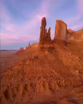Badlands and The Pope Badlands in front of of The Pope rock formation, Round Rock, Arizona.