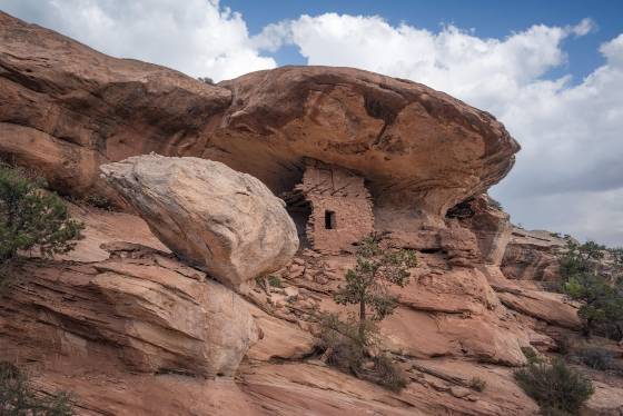 Tilted Boulder and Long Poles Ruin Tilted Boulder and Long Poles Ruin in Southeast Utah