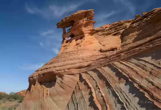 Border Arch Small double arch seen on the hike to Steamboat Rock, Grand Staircase Escalante National Monument. The arch is just past the Arizona Utah state line.