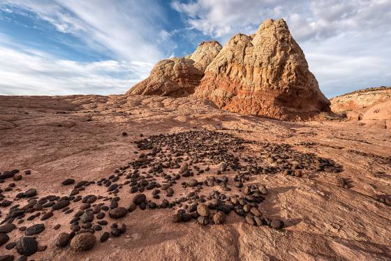 Moqui CIty Moqui martbles lying in Polygonal cracks at The White Pocket