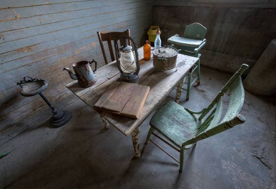 Guernsey Dairy Barn Upstairs 2 Table, chairs, and highchair seen inside the Guernsey Dairy Farm on Ritter Island