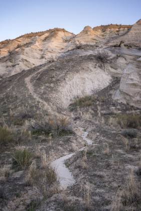 Exit from the West Fork of Wahweap Creek Steep trail up a clay and sand dune used to exit the West Fork