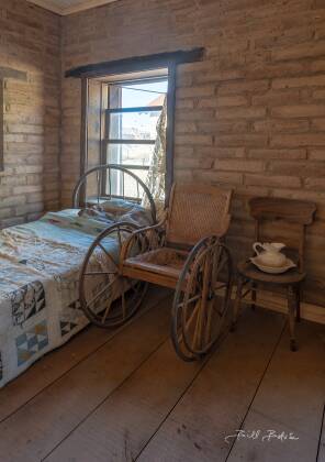 Wheelchair Wheelchair seen in the doctor's office in Vulture City ghost town, Arizona.