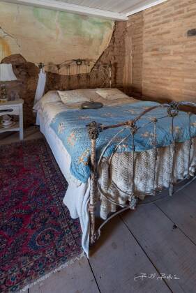 Master Bedroom Master beedroom in the brothel at Vulture City ghost town, Arizona.