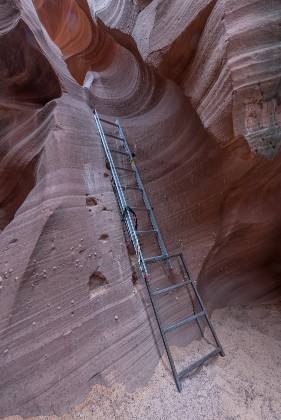 Shaky Ladder A shaky ladder in Waterholes Canyon. Note the Moqui Steps on the wall, and the scratch marks from ladder movement