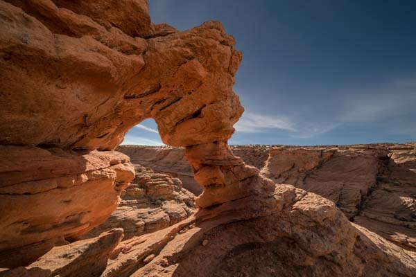 An arch on the north rim of Waterholes Slot Canyon
