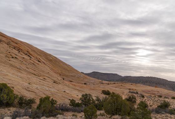 Helmholz Clouds and Yellow Rock Helmholz clouds at Yellow Rock in Grand Staircase Escalante National Monument, Utah